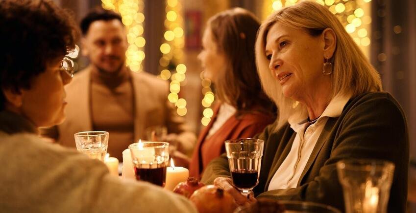 People enjoying drink at a formal occasion